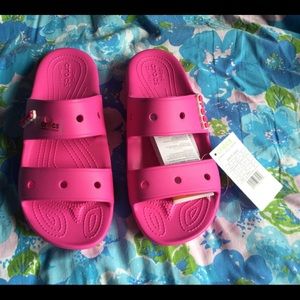Brand new electric pink Crocs sandals